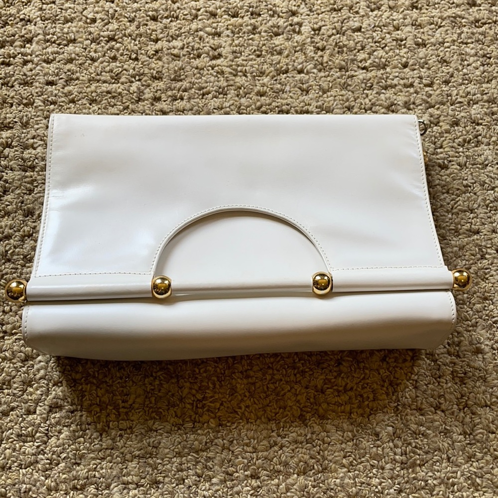 Paloma Picasso white fold over clutch bag